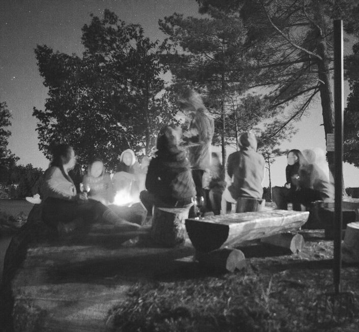 decorative image of a group of people camping