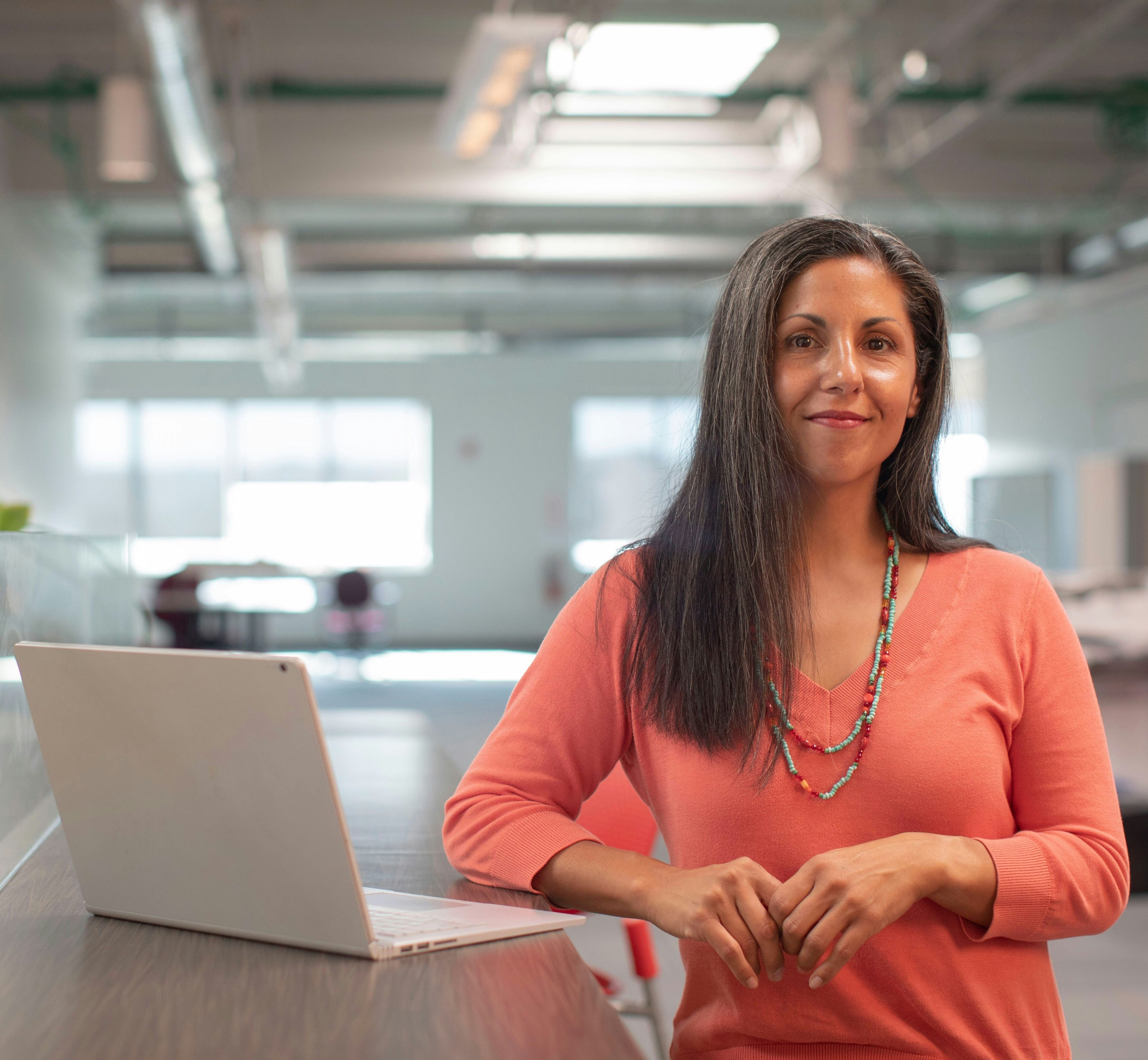 decoraive image of a business woman with a laptop